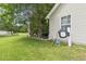 View of the home's backyard, showcasing the lawn and vinyl siding at 2738 Canvasback Trail, Myrtle Beach, SC 29588