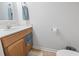 Bathroom featuring a single sink, wood vanity, and toilet with towels hanging on the wall at 2738 Canvasback Trail, Myrtle Beach, SC 29588