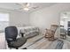 Bedroom featuring carpet flooring, a ceiling fan, a rocking chair and an office chair and desk at 2738 Canvasback Trail, Myrtle Beach, SC 29588