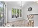 Bright breakfast nook with a bay window and a view of the backyard at 2738 Canvasback Trail, Myrtle Beach, SC 29588