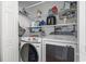 Well-organized laundry room featuring a Samsung washer and dryer, along with ample shelving at 2738 Canvasback Trail, Myrtle Beach, SC 29588