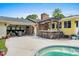 This beautiful backyard features a pool, outdoor bar, seating, and well maintained landscaping at 280 Morgan Ave., Little River, SC 29566
