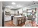 Bright kitchen with white cabinets and breakfast bar area at 280 Morgan Ave., Little River, SC 29566