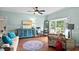 Bright living room with hardwood floors, bay window, and stylish furnishings at 280 Morgan Ave., Little River, SC 29566