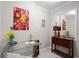 Bright office featuring a glass top desk, accent furniture and a mirror at 280 Morgan Ave., Little River, SC 29566