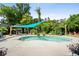Inviting backyard pool with shade and an outdoor dining space at 280 Morgan Ave., Little River, SC 29566