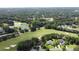Beautiful aerial view of golf course community, featuring homes, water features, and lush greenery at 280 Oatland Lake Rd., Pawleys Island, SC 29585