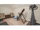 Finished basement equipped with home gym equipment and seating area at 280 Oatland Lake Rd., Pawleys Island, SC 29585