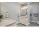Bright bathroom featuring double granite sinks and plenty of storage space at 280 Oatland Lake Rd., Pawleys Island, SC 29585