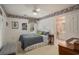This bedroom offers a ceiling fan, and easy access to an attached bathroom at 280 Oatland Lake Rd., Pawleys Island, SC 29585