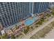Aerial view of beachfront resort with lazy river and outdoor pool at 3000 N Ocean Blvd. # 230, Myrtle Beach, SC 29577