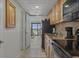 Efficient kitchen with modern appliances and a view to the beachfront patio at 3000 N Ocean Blvd. # 230, Myrtle Beach, SC 29577