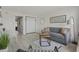Cozy living room features comfortable seating, stylish rug, modern decor, and a doorway leading to another room at 3000 N Ocean Blvd. # 230, Myrtle Beach, SC 29577