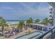 View of lazy river, pool bar, and beachfront from resort balcony at 3000 N Ocean Blvd. # 230, Myrtle Beach, SC 29577