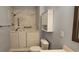 Bathroom featuring accessible tub and shower with grab bar and cabinet storage at 309 Outboard Dr., Murrells Inlet, SC 29576