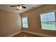 Bedroom featuring natural light through two windows and a ceiling fan at 309 Outboard Dr., Murrells Inlet, SC 29576