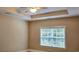 Bright bedroom featuring a ceiling fan, recessed lighting, and a window with a view of the outdoors at 309 Outboard Dr., Murrells Inlet, SC 29576