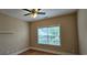 Bedroom with wood floors, ceiling fan and window at 309 Outboard Dr., Murrells Inlet, SC 29576