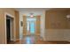 Inviting foyer with tile floors, wainscoting, and a glass-paneled front door at 309 Outboard Dr., Murrells Inlet, SC 29576