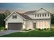 Charming two-story home with a two-car garage, well-manicured lawn, and welcoming front entrance at 315 River Edge Dr., Myrtle Beach, SC 29588