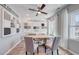 Contemporary office space with a table desk, comfortable chairs, and a large window for plenty of natural light at 315 River Edge Dr., Myrtle Beach, SC 29588