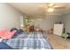 Spacious bedroom with ceiling fan, ensuite bathroom and playful decor at 318 Muirfield Rd., Myrtle Beach, SC 29588
