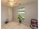 Bedroom featuring neutral walls, a ceiling fan, and a tiled floor at 318 Muirfield Rd., Myrtle Beach, SC 29588