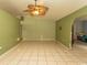 Open living area with tile floors and ceiling fan providing comfortable living at 318 Muirfield Rd., Myrtle Beach, SC 29588
