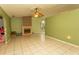Spacious living room featuring tile flooring and a cozy fireplace for a comfortable ambiance at 318 Muirfield Rd., Myrtle Beach, SC 29588