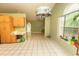 Open-concept kitchen area that extends into the living room with a cozy fireplace at 318 Muirfield Rd., Myrtle Beach, SC 29588