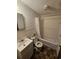 Bathroom with white fixtures, tub, and vinyl flooring at 331 Dixon St., Mullins, SC 29574