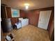 Laundry area features a washing machine, water heater, and utility door at 331 Dixon St., Mullins, SC 29574