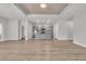 Spacious living room with wood-look floors, recessed ceilings and open concept design at 346 High Falls Dr., Conway, SC 29526
