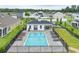 Community pool with lounge chairs and manicured landscaping in Gathering friendly neighborhood at 346 High Falls Dr., Conway, SC 29526