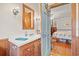 Bathroom with a sink vanity and a view into the bedroom at 401 Harmon Park Blvd., Marion, SC 29571