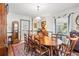 Traditional dining room featuring hardwood floors, seating for eight, and built-in hutch at 401 Harmon Park Blvd., Marion, SC 29571