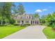 Charming home with well-maintained landscaping and a long driveway at 401 Harmon Park Blvd., Marion, SC 29571