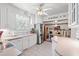 Bright kitchen with white cabinets, stainless steel appliances, and a view into the breakfast nook at 401 Harmon Park Blvd., Marion, SC 29571