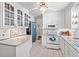 Bright kitchen with white cabinets, tile floors, lots of counter space, white appliances, and lots of storage space at 401 Harmon Park Blvd., Marion, SC 29571