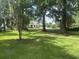Large front yard with a view of a charming home at 401 Harmon Park Blvd., Marion, SC 29571