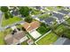 Aerial view of a home with fenced backyard, patio, and lush neighborhood at 402 Bristlecone St., Longs, SC 29568