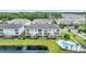 Aerial view of the complex showing manicured grounds, swimming pool and multiple buildings at 4142 Hibiscus Dr. # 102, Little River, SC 29566