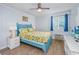 Comfortable bedroom with bright bedding and a view from the window at 4201 N Ocean Blvd. # Ocean View, Myrtle Beach, SC 29572