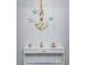 Charming beach-themed decor, including an anchor and star ornaments, atop a white console table at 4201 N Ocean Blvd. # Ocean View, Myrtle Beach, SC 29572
