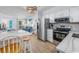 Modern kitchen open to the living room and featuring stainless steel appliances at 4201 N Ocean Blvd. # Ocean View, Myrtle Beach, SC 29572