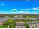 Expansive aerial view of condo complex with river access, golf course and beautiful landscaping at 4366 Rivergate Ln. # 306, Little River, SC 29566