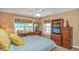 Bright bedroom with a desk, natural light, and a comfortable bed at 4366 Rivergate Ln. # 306, Little River, SC 29566