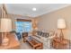 A comfortable living room featuring a large window and comfortable seating at 4366 Rivergate Ln. # 306, Little River, SC 29566