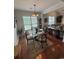 Charming dining area with ample natural light and stylish furnishings at 448 Mahogany Dr. # 201, Murrells Inlet, SC 29576