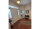 Inviting foyer featuring hardwood floors, elegant decor, and natural light at 448 Mahogany Dr. # 201, Murrells Inlet, SC 29576